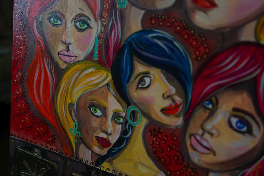 Detail of a painting by Ali Al Jumaili — layered portraits